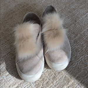 Candie’s Pom Pom sneakers.